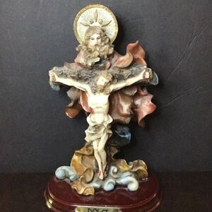 Sculpture God over Jesus on the cross label Dolci